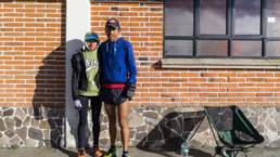 Runners in front of a brick wall at Iztaccihuatl & Popocatepetl National Park